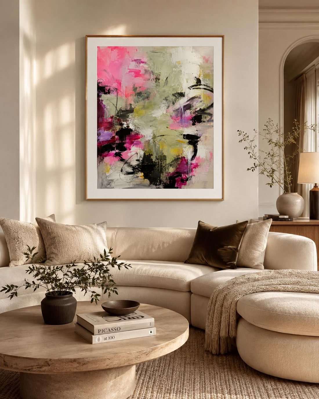 Large colourful abstract artwork on a wall in a modern living room