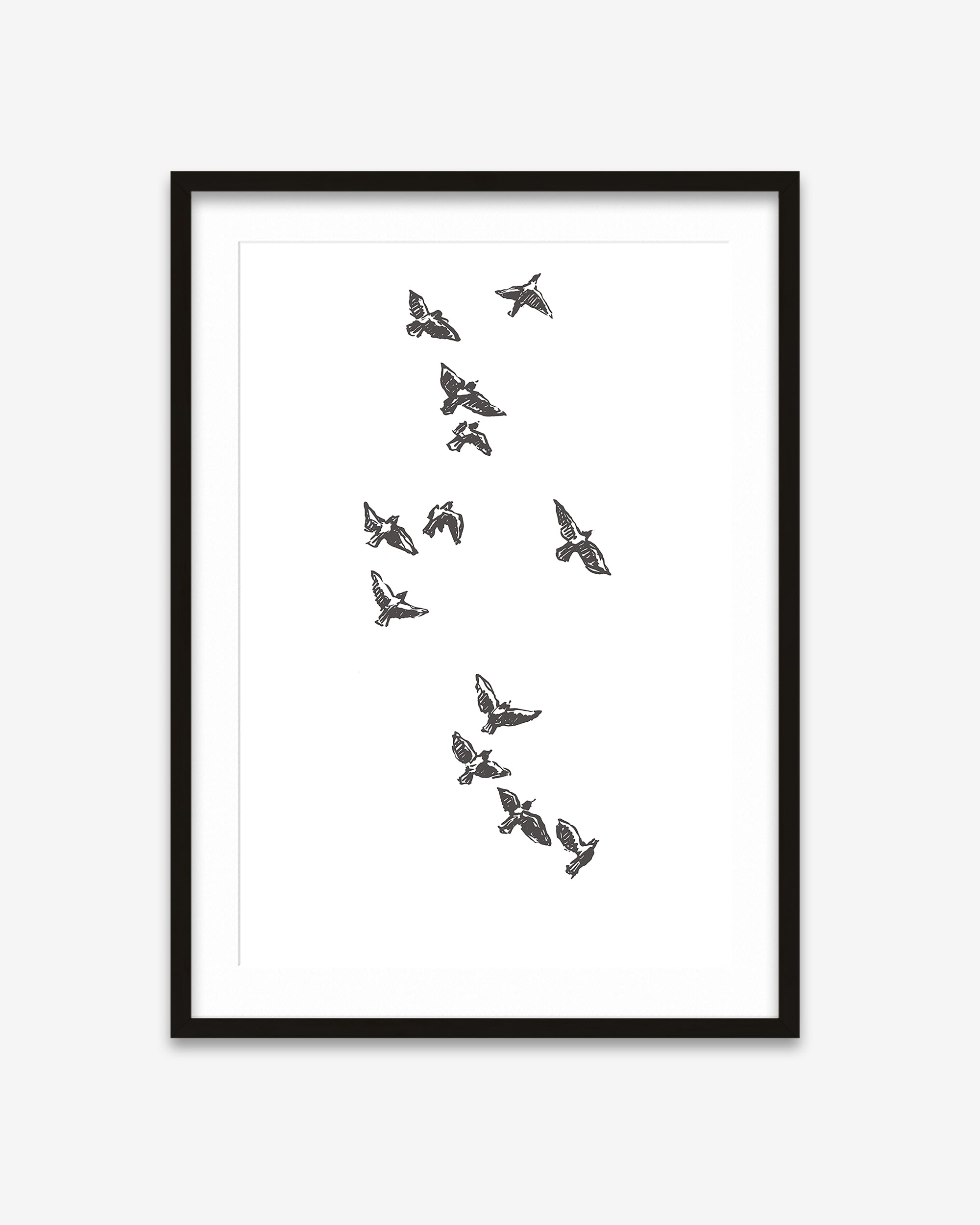 Framed artwork with black and white butterfly illustrations on a white background