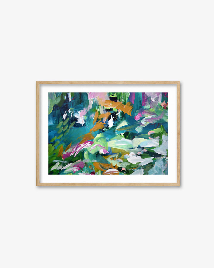 Framed abstract painting with colorful brush strokes on a white background