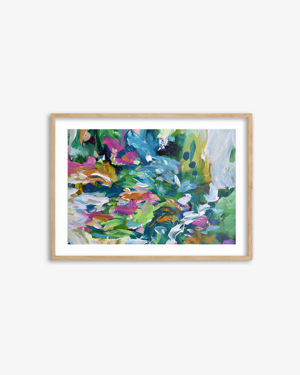 Framed abstract artwork with colorful brush strokes on a white wall