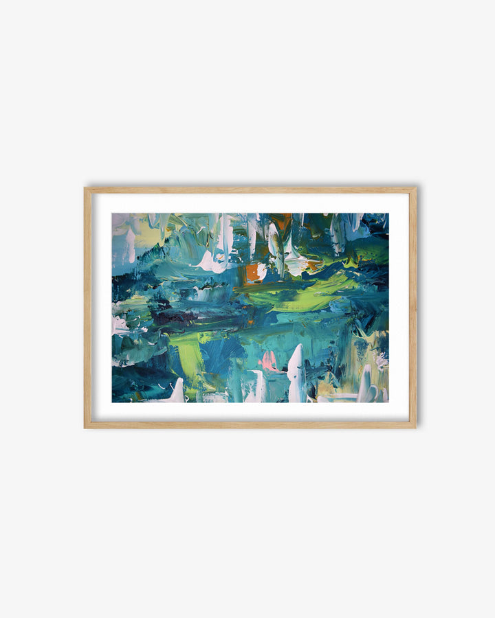 Framed abstract painting with blue and green hues on a white wall
