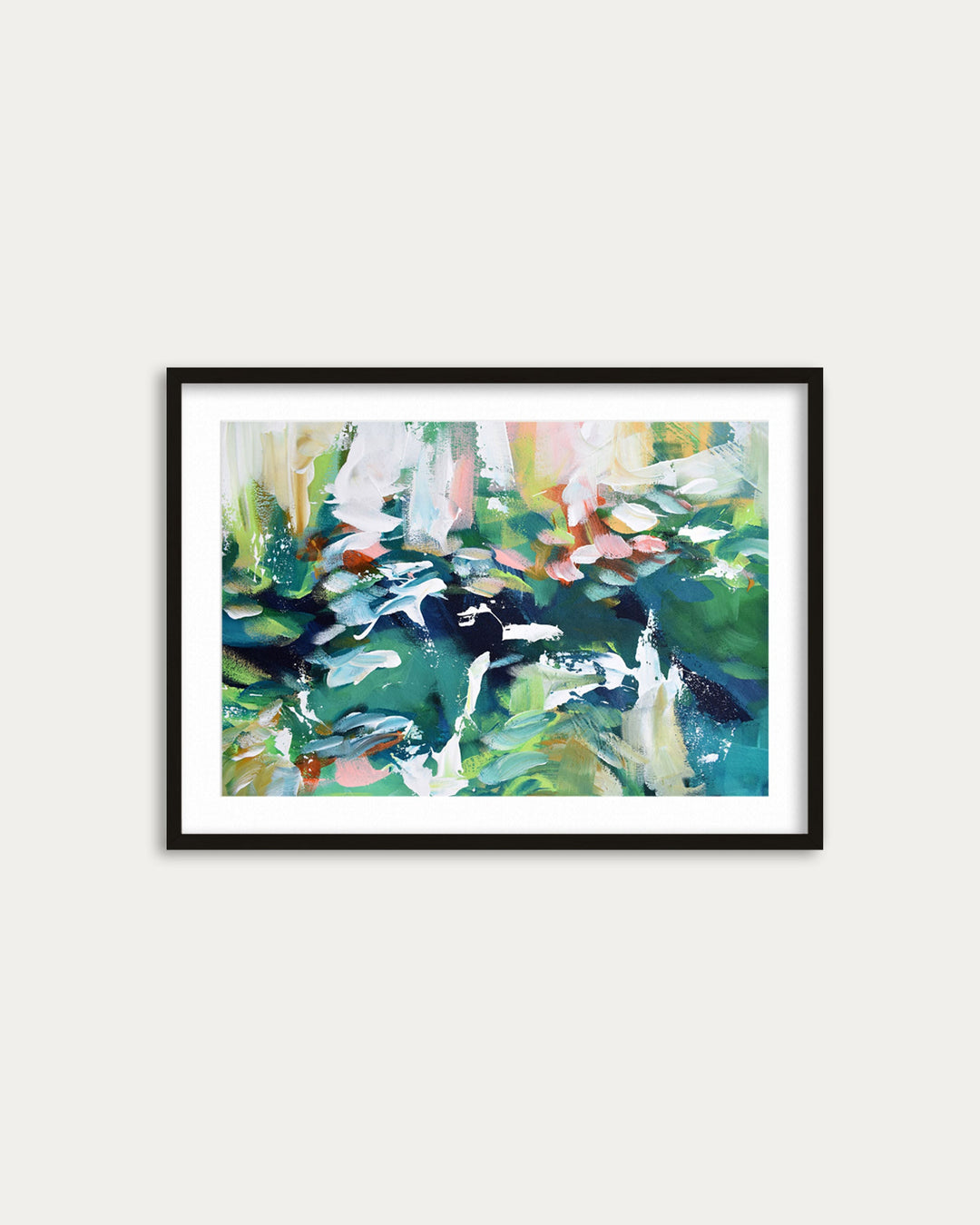 Framed abstract painting with colorful brush strokes on a white wall