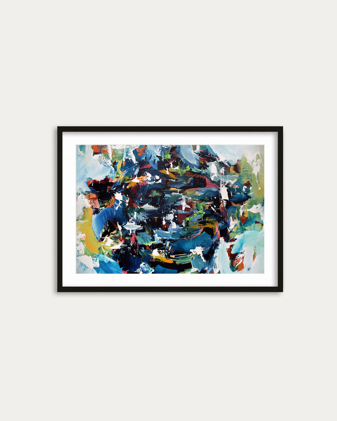 Framed abstract painting with colorful abstract design on a white wall