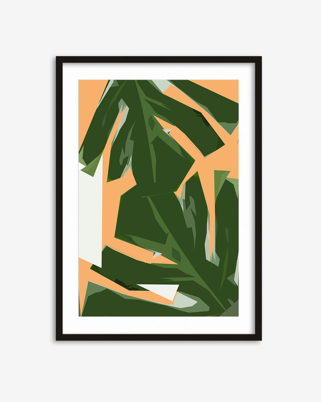 Framed artwork with green leaves on a peach background