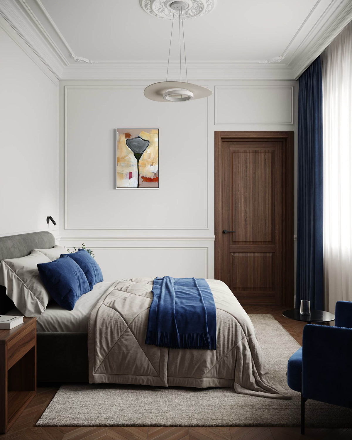 A styled bedroom interior featuring a bed dressed in beige bedding and blue pillows/throw, with a dark wood door, navy curtains, a blue accent chair, and a framed abstract painting on the wall.