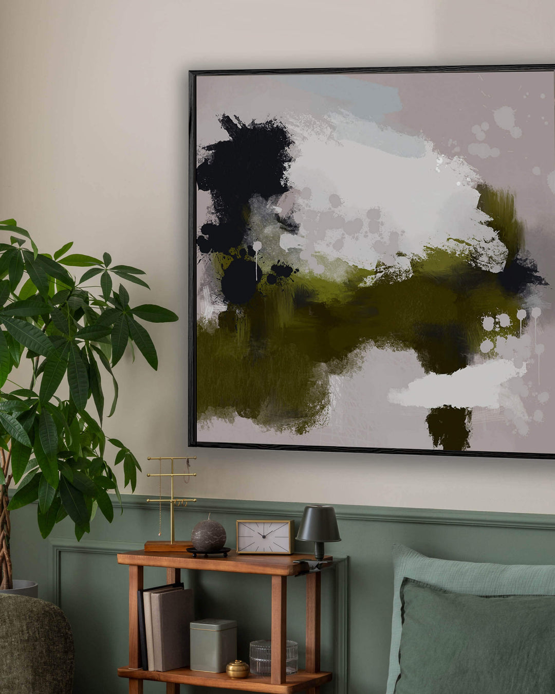 large framed abstract canvas art on a wall in a bedroom with green wall panelling