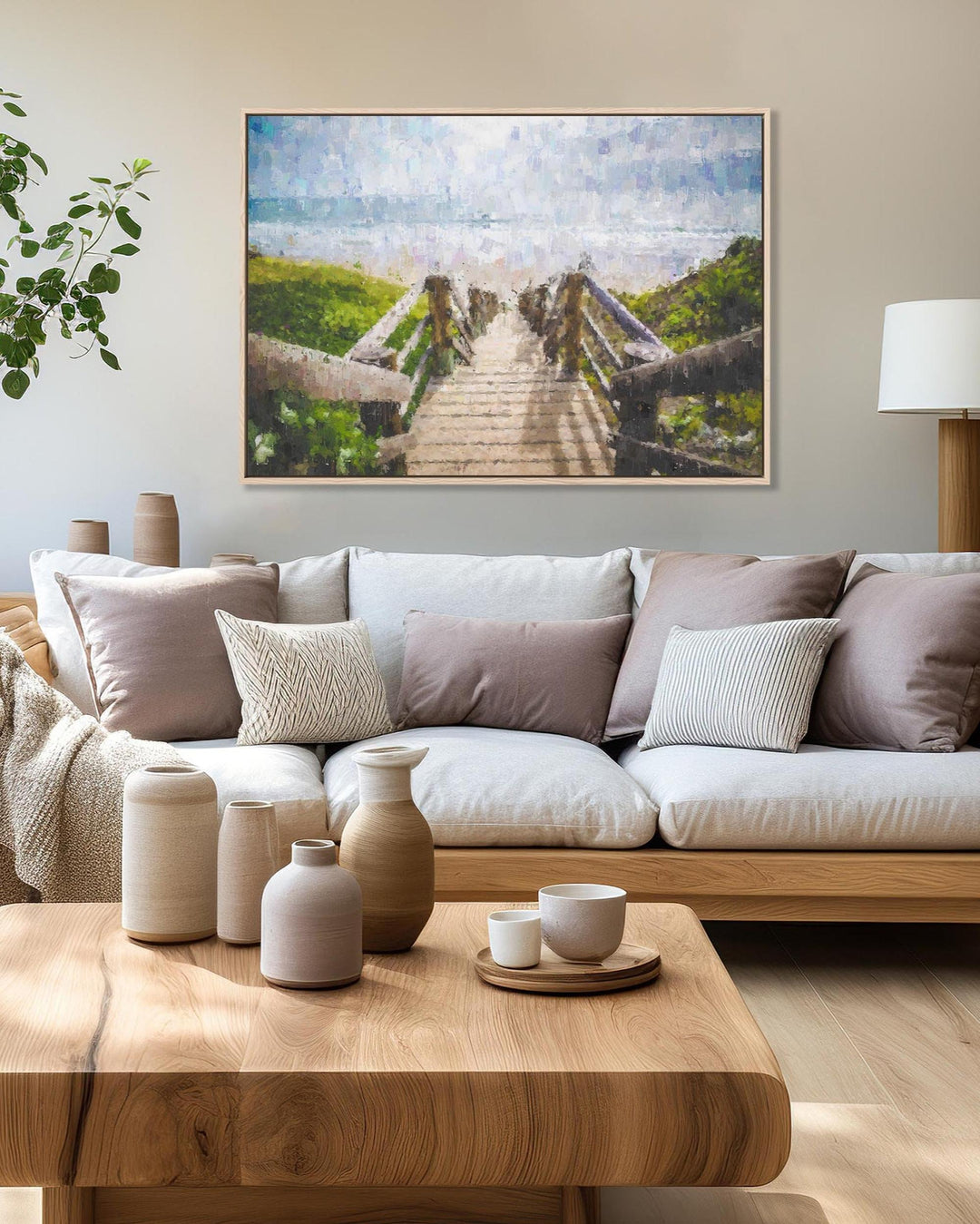 Modern living room with a wooden sofa, coffee table, and decorative items.