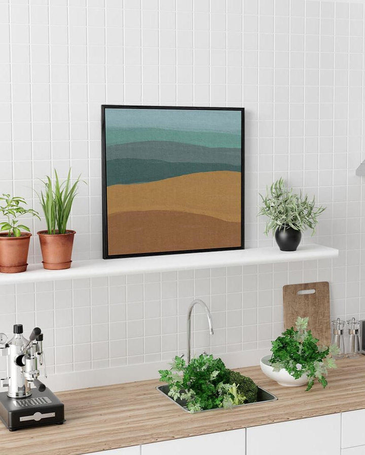 Modern kitchen with a shelf displaying plants and a framed abstract art piece.