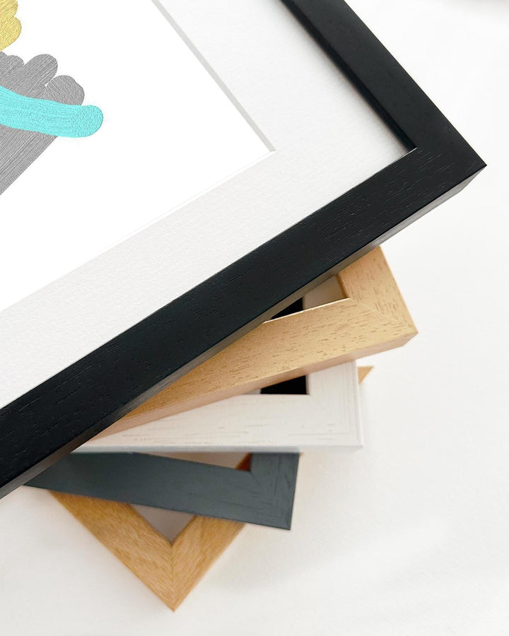 Stack of various photo frames on a white background