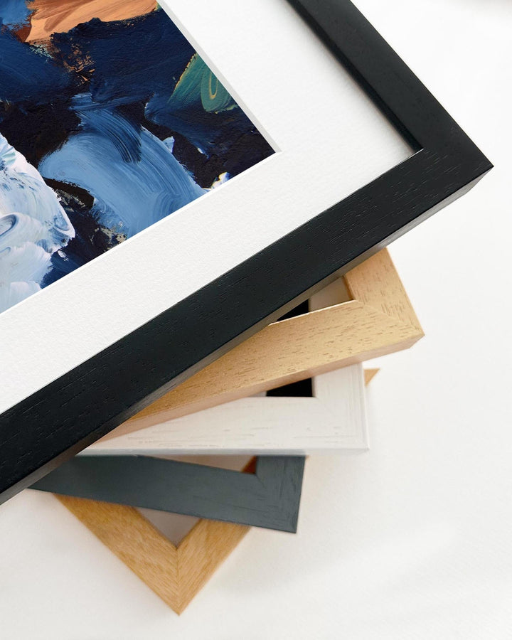 Framed abstract painting with various color frames on a white background