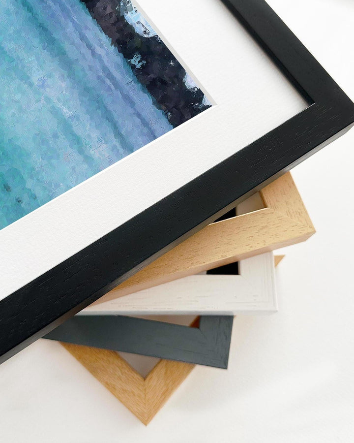 Collection of various picture frames on a white surface