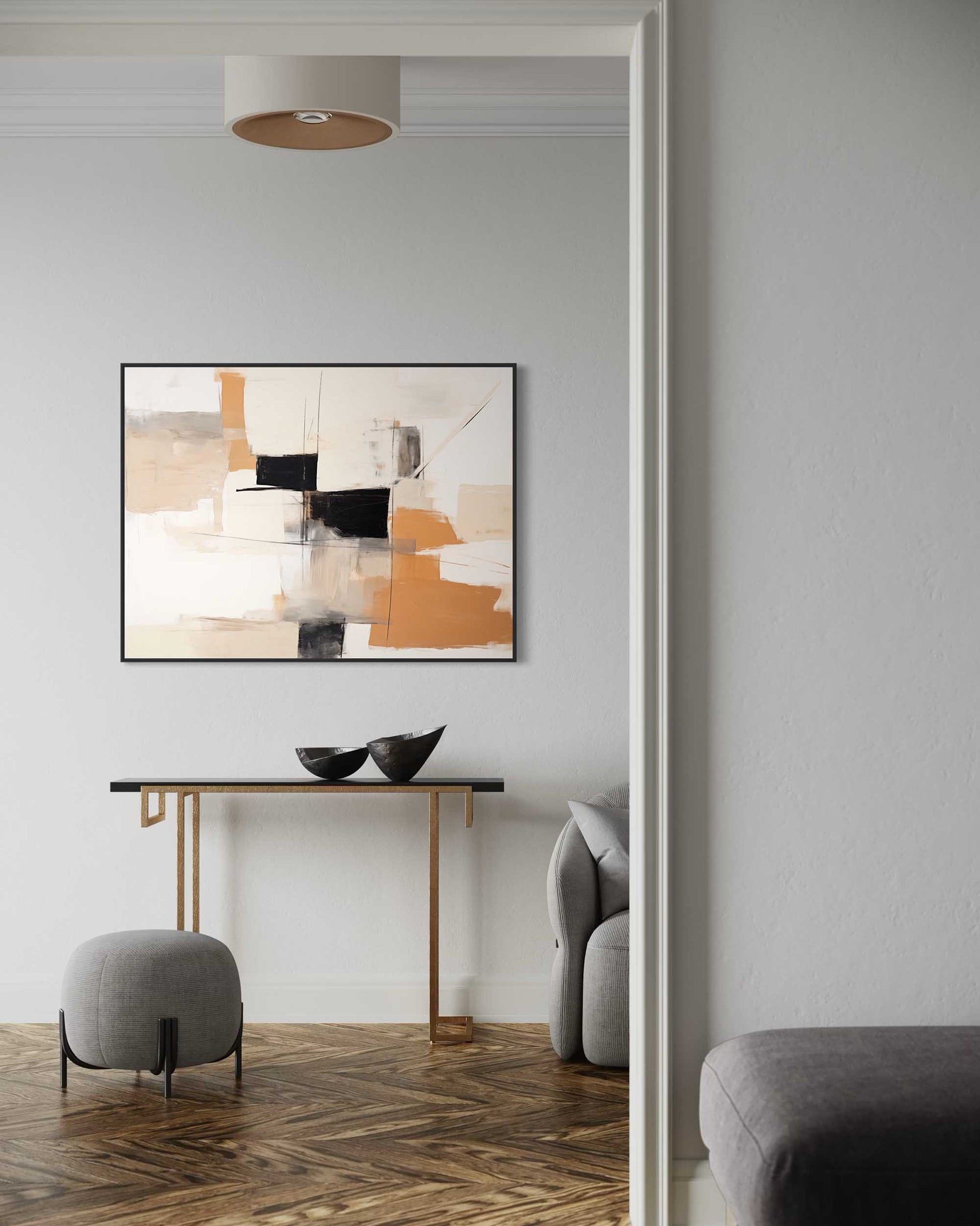 Modern interior with abstract art on a wall, console table, and gray sofa.