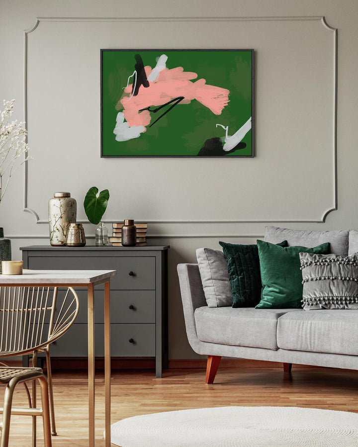 Living room with a gray sofa, abstract painting on the wall, and a small table.