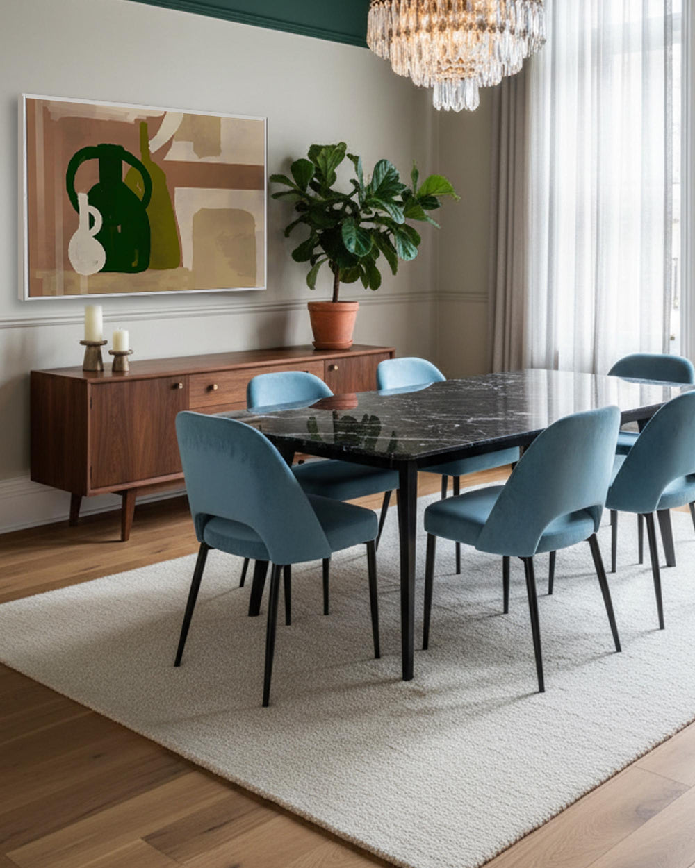 Dining room with a marble table and blue chairs, featuring a sideboard and abstract art on the wall.