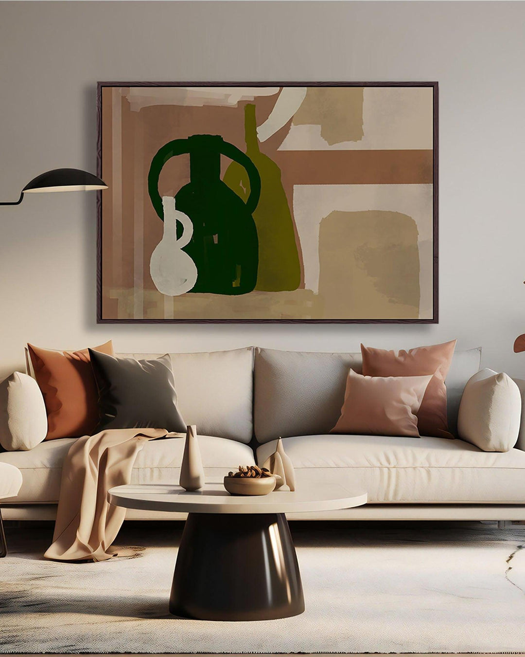 Living room with a beige sofa, abstract art on the wall, and a round coffee table.