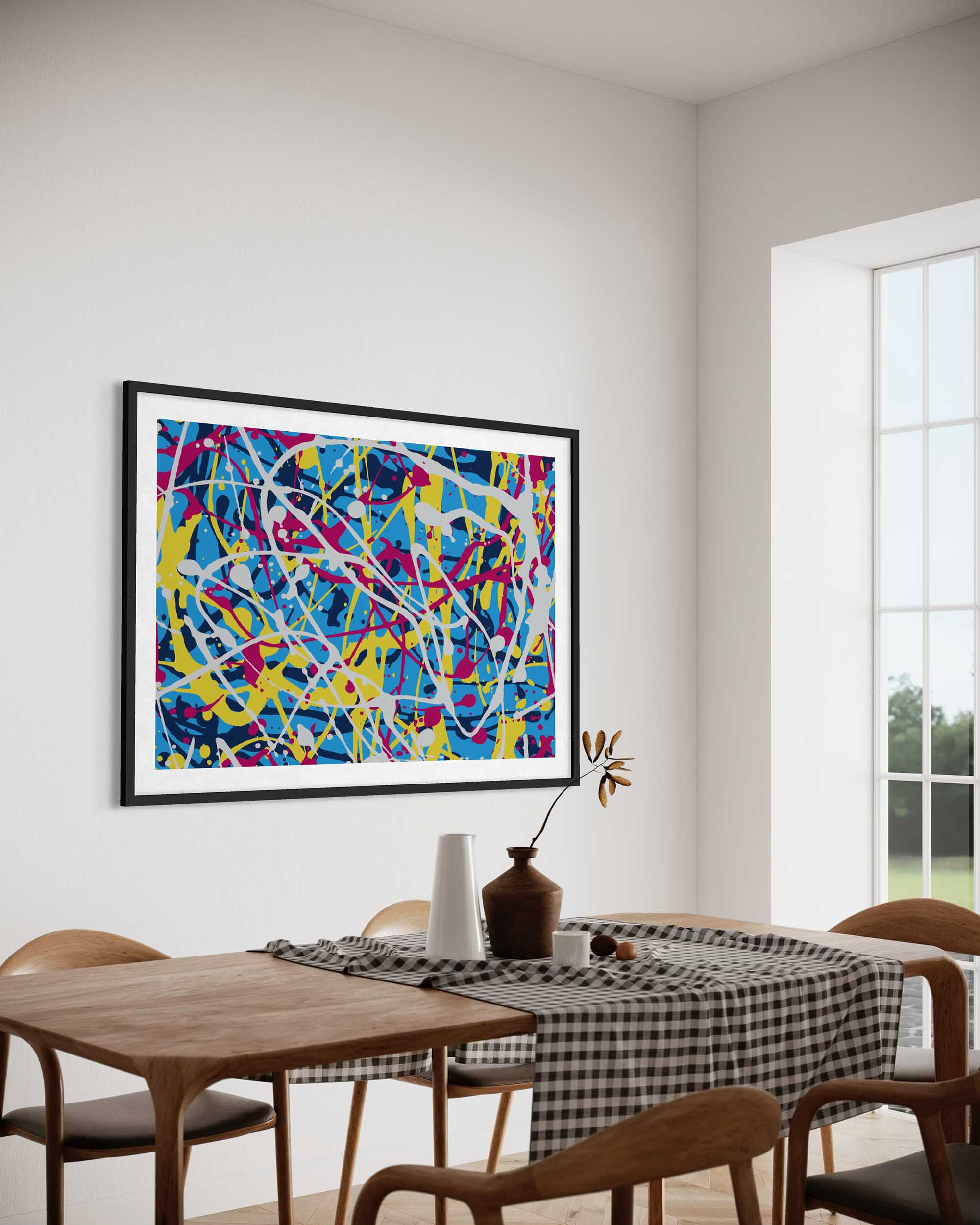Colorful abstract painting on a wall above a dining table with chairs.