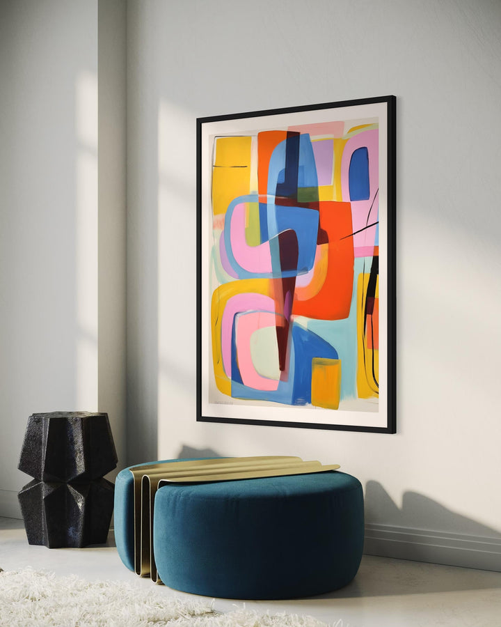 Colorful abstract art piece on a wall with modern furniture below