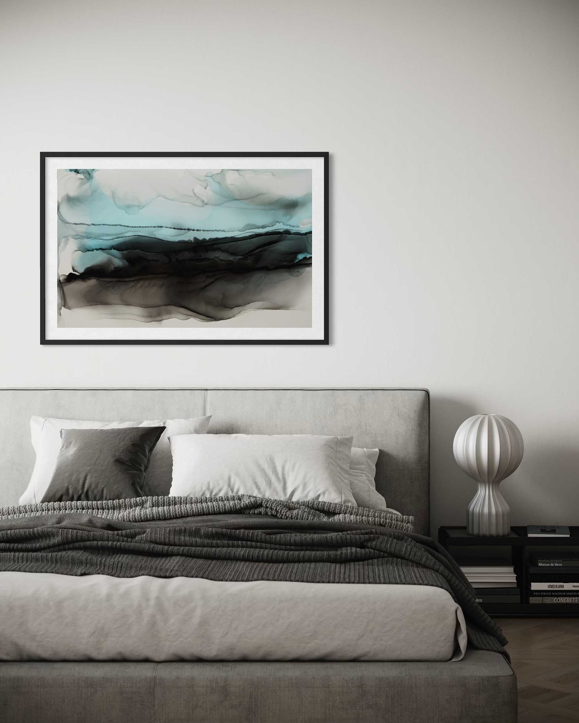 Modern bedroom with abstract art above a bed