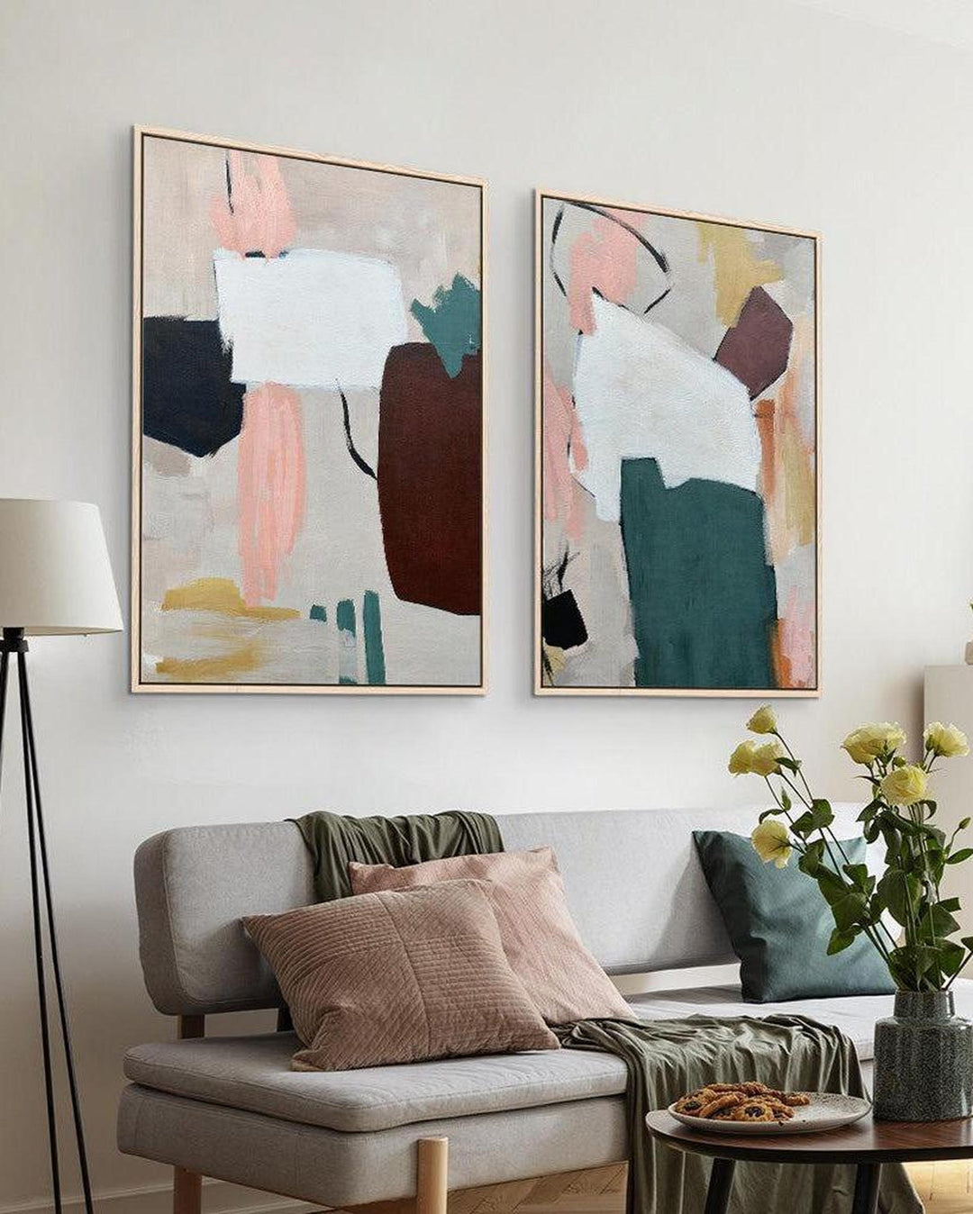 a large set of 2 abstract canvas artwork in the living room above a sofa