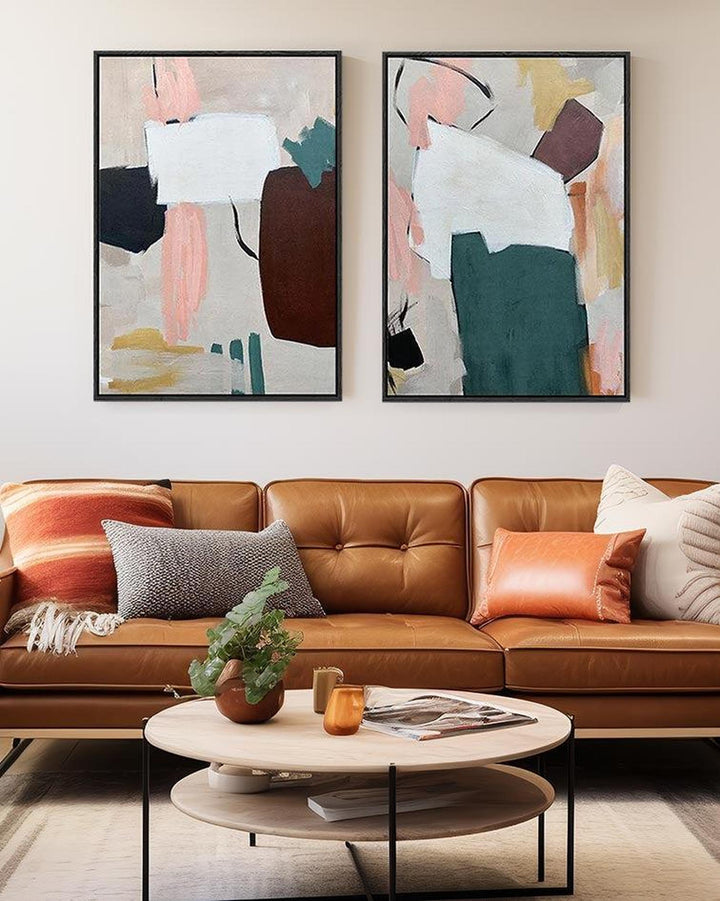 Extra large canvas art set above sofa in living room