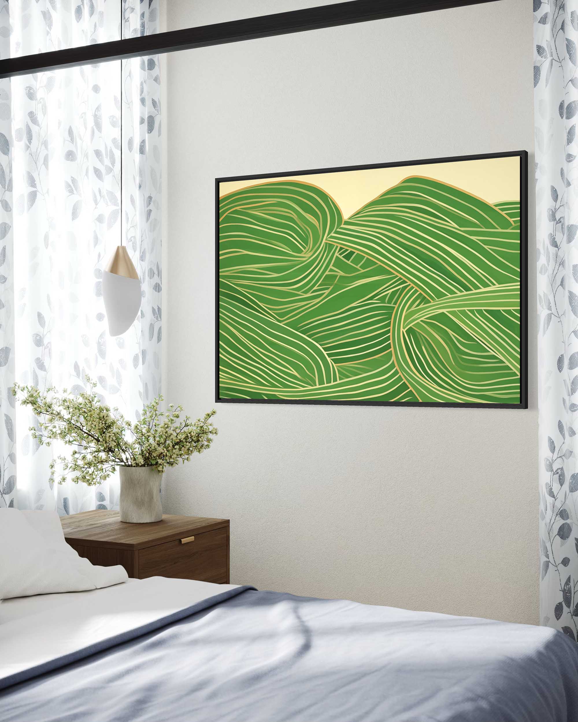 Framed green abstract artwork on a wall above a bed with a side table and plant.