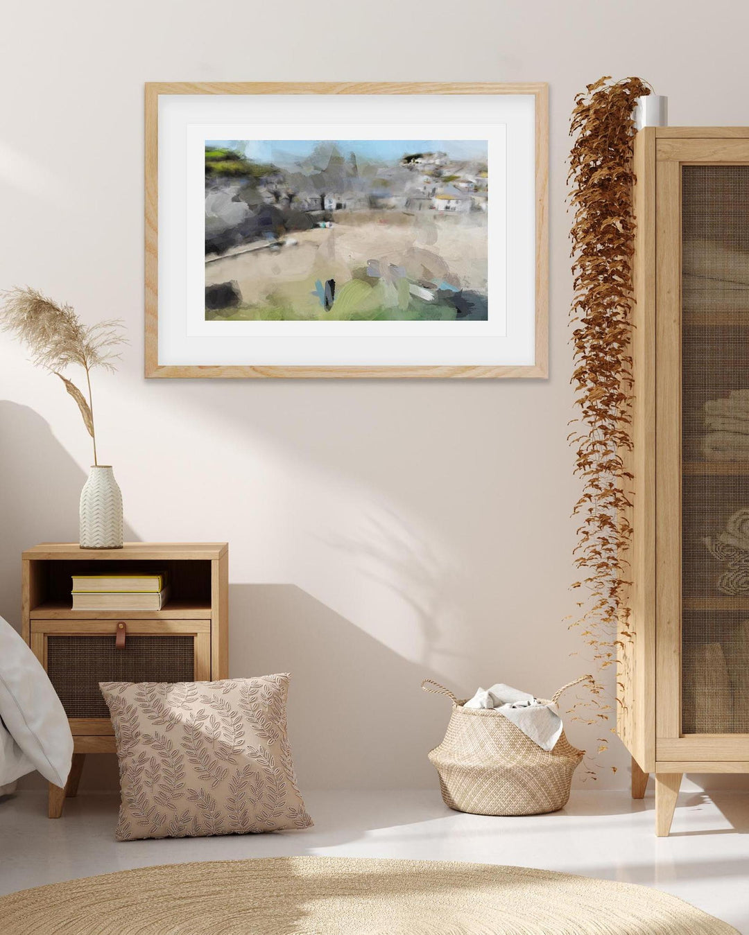 Framed artwork on a wall in a room with decorative elements.