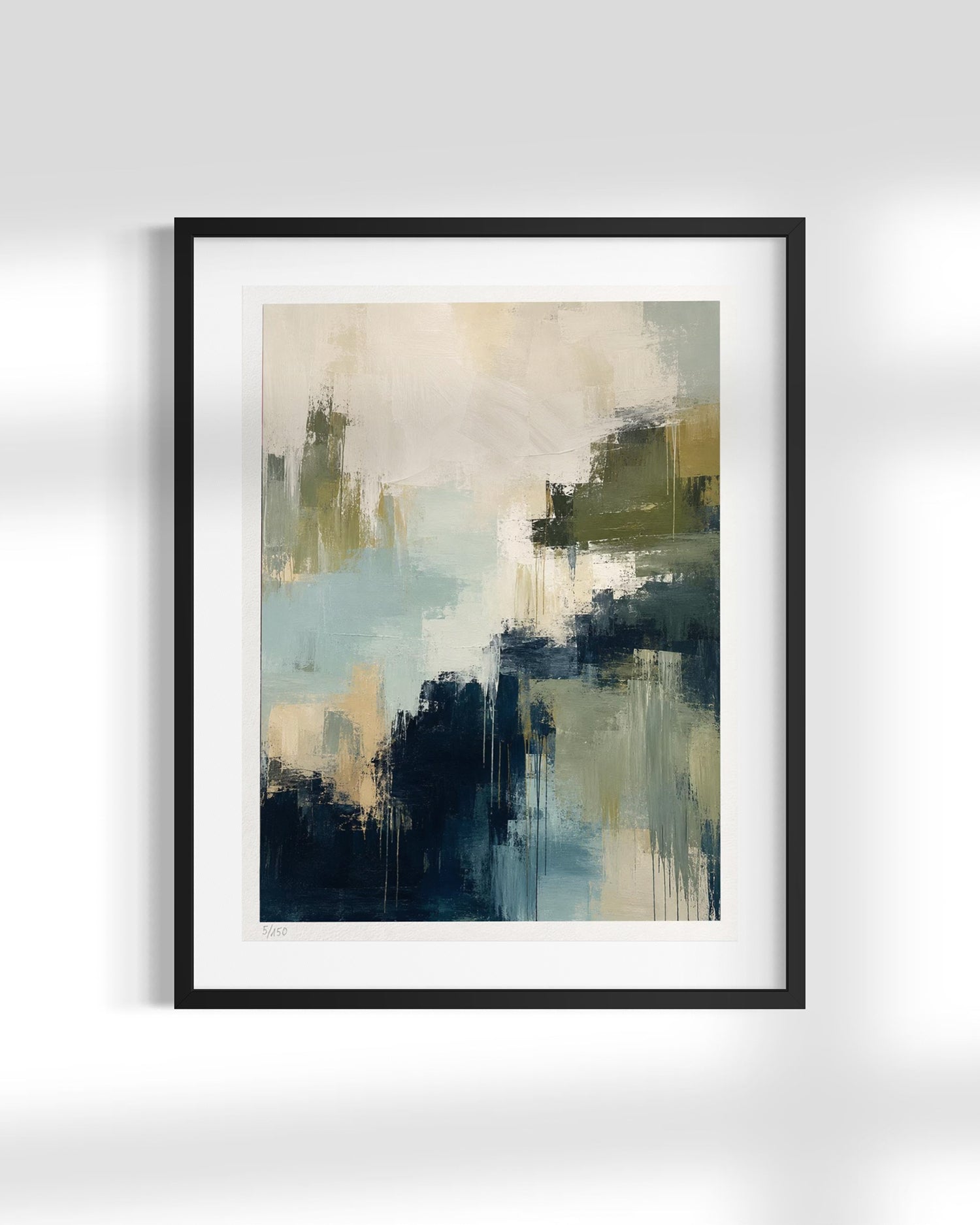 A framed abstract art print featuring textured brushstrokes in navy, teal, olive green, and cream, presented in a black frame with a white mat against a light gray wall.
