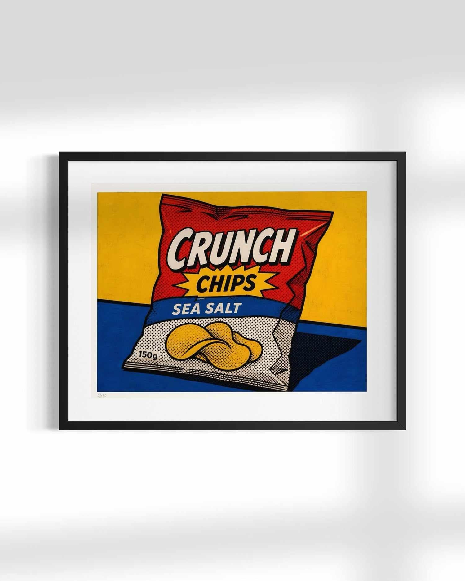 A framed pop-art style print depicting a bag of Crunch Chips Sea Salt, shown against a clean white wall with soft shadows.