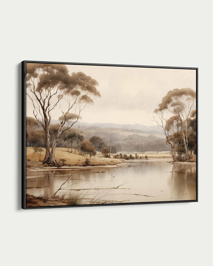 Framed artwork of a landscape with trees and a lake.