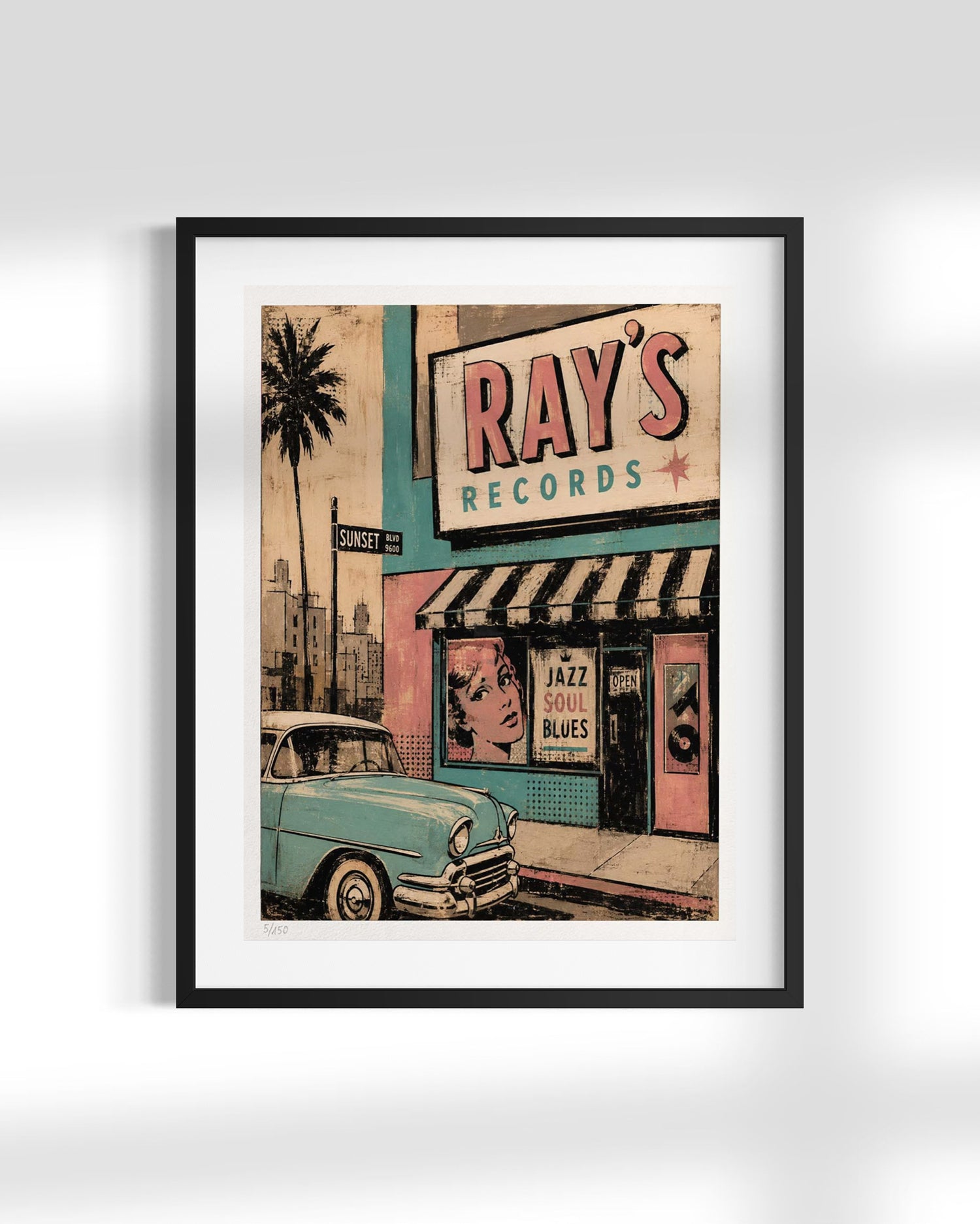 A framed vintage-style art print depicting a retro street scene with a teal car, a palm tree, and a storefront sign reading 'RAY'S RECORDS,' shown against a light gray background.