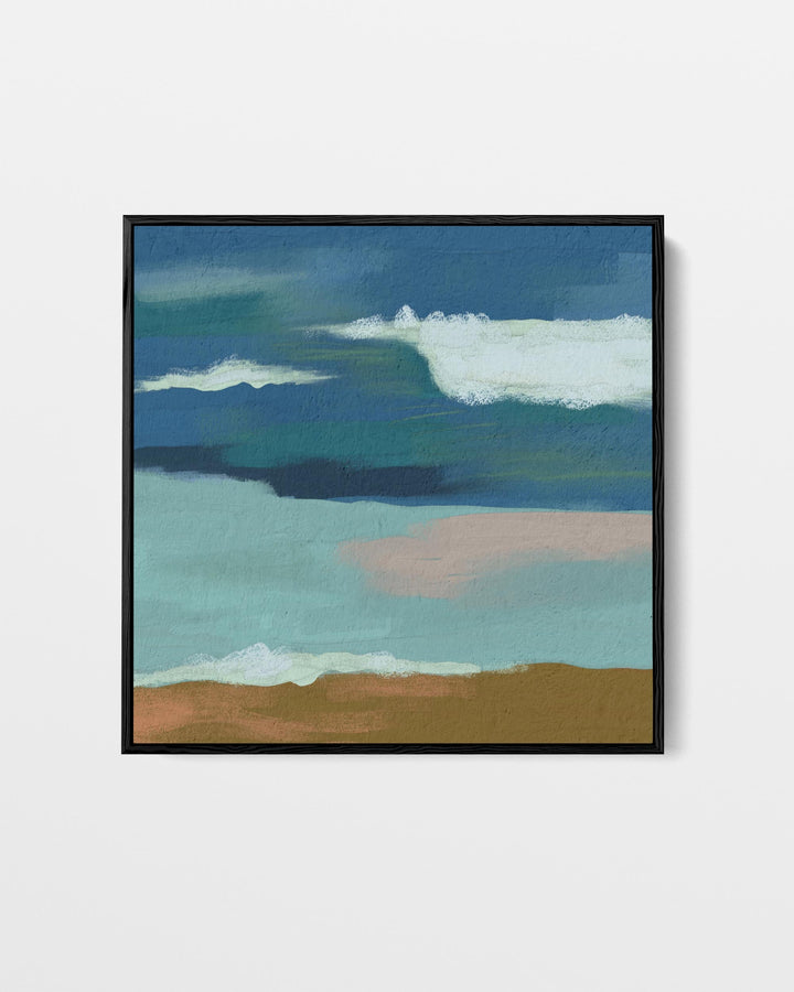 Framed painting of a landscape with blue sky and clouds on a white wall
