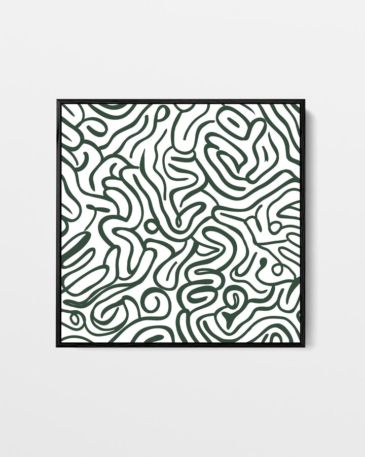 Framed artwork with abstract black and white pattern on a light gray background