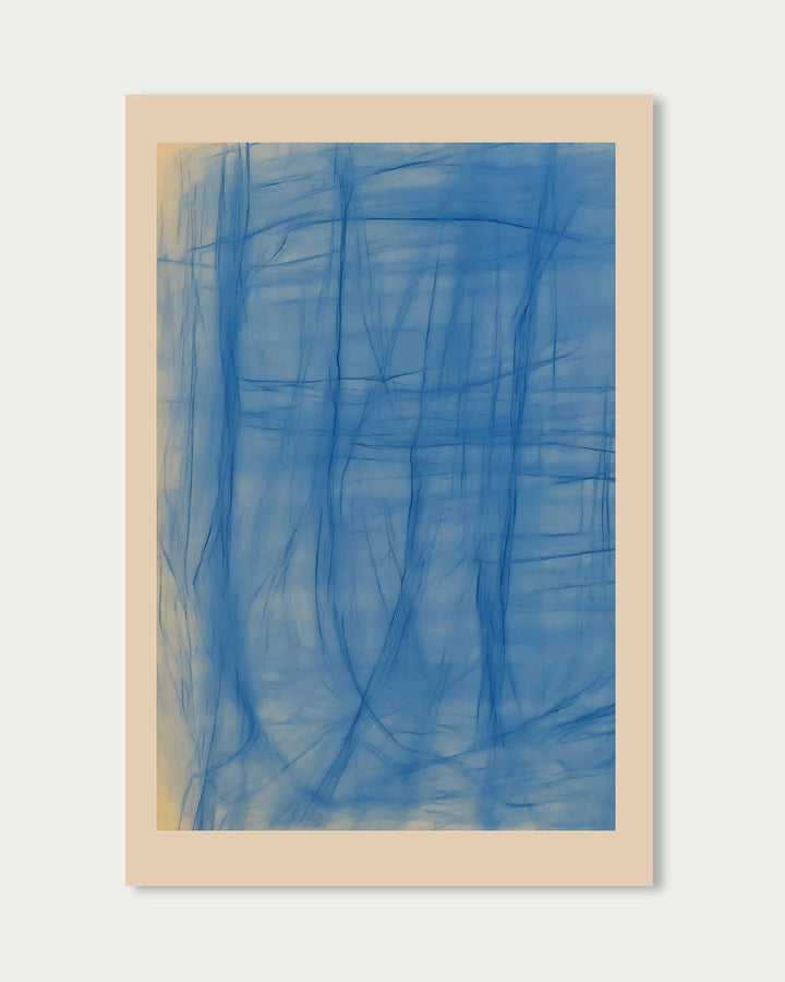Framed abstract artwork with blue brush strokes on a light gray background