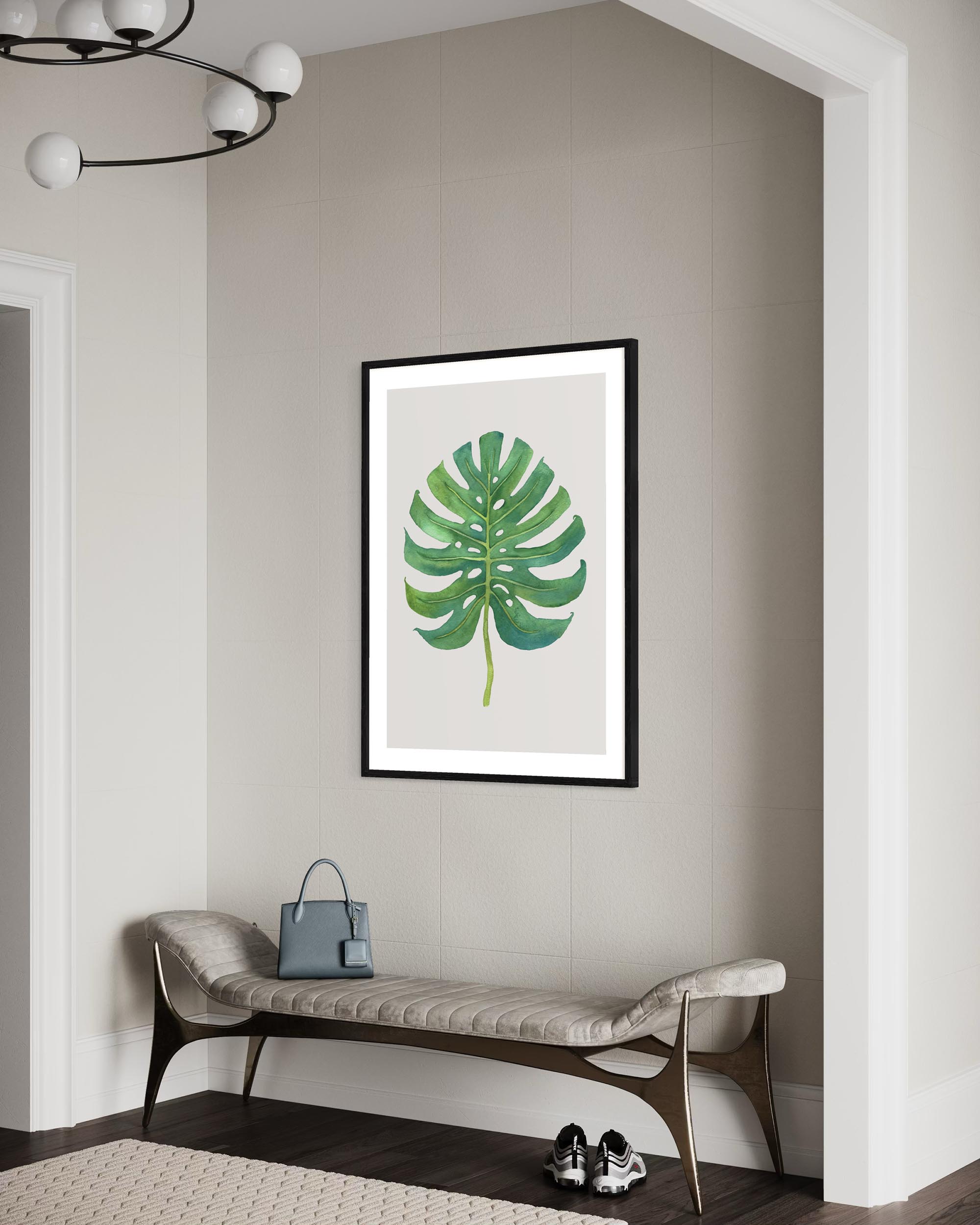 large monstera watercolour art print framed on a wall