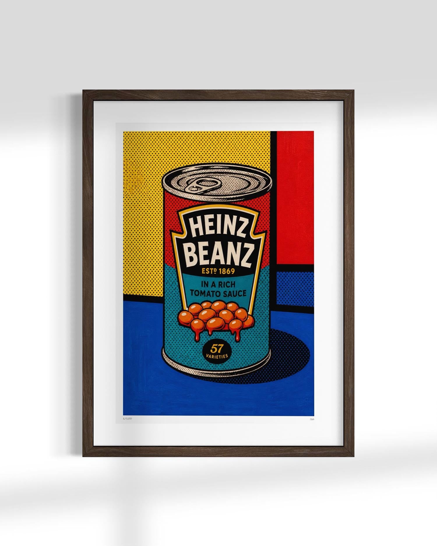 A framed pop art print featuring a stylized can of Heinz Beanz tomato sauce on a bold yellow, red, and blue background, displayed against a light gray wall.