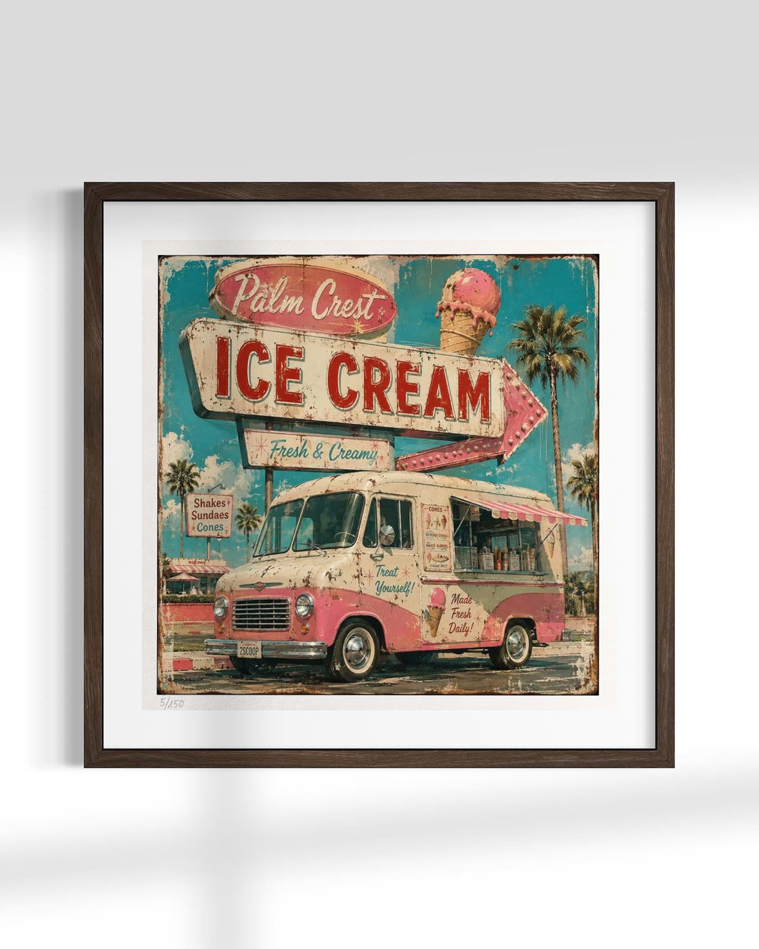 Framed vintage-style wall art showing a retro ice cream truck and sign, displayed against a light gray wall.