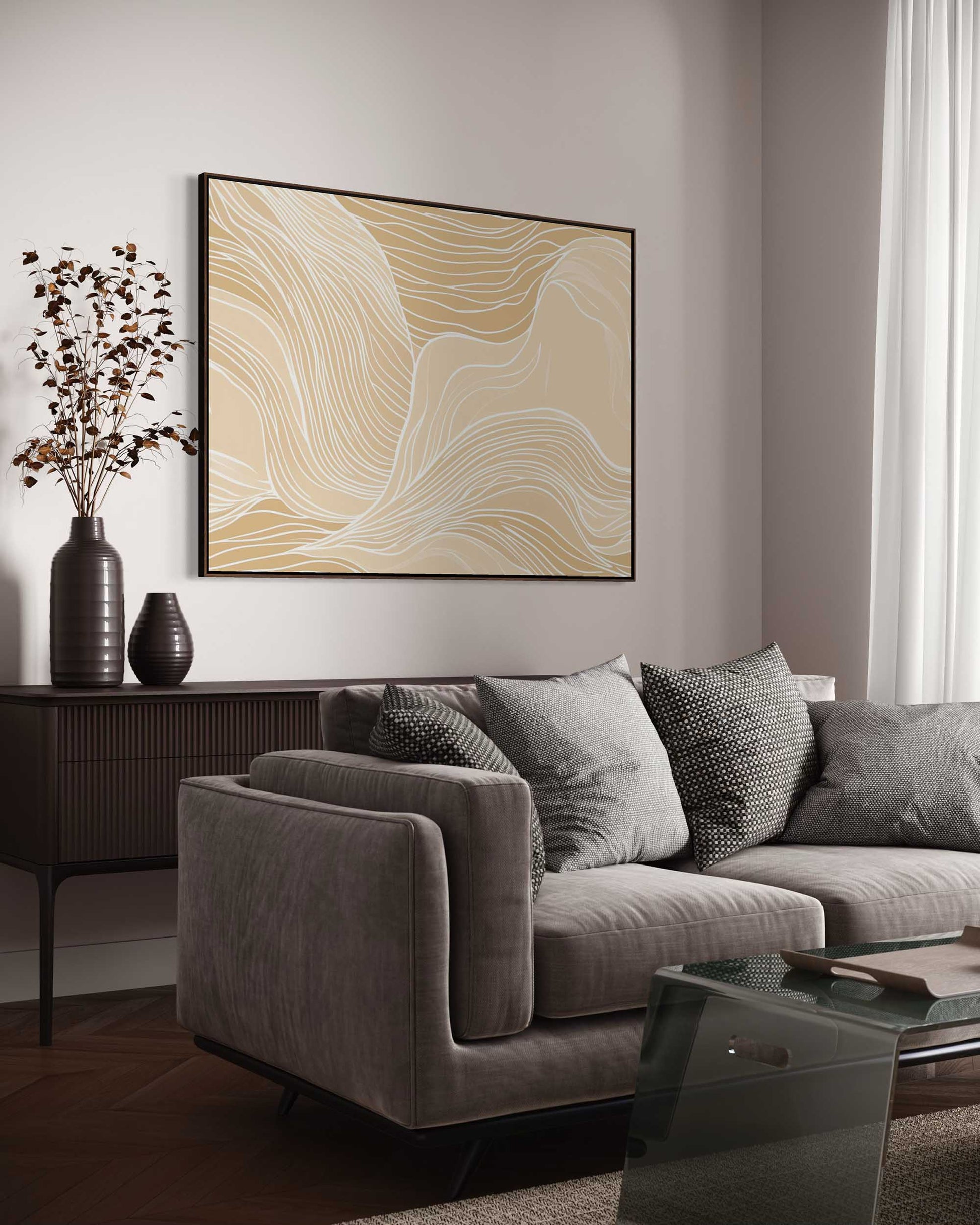 Modern living room with a gray sofa, coffee table, and abstract wall art.