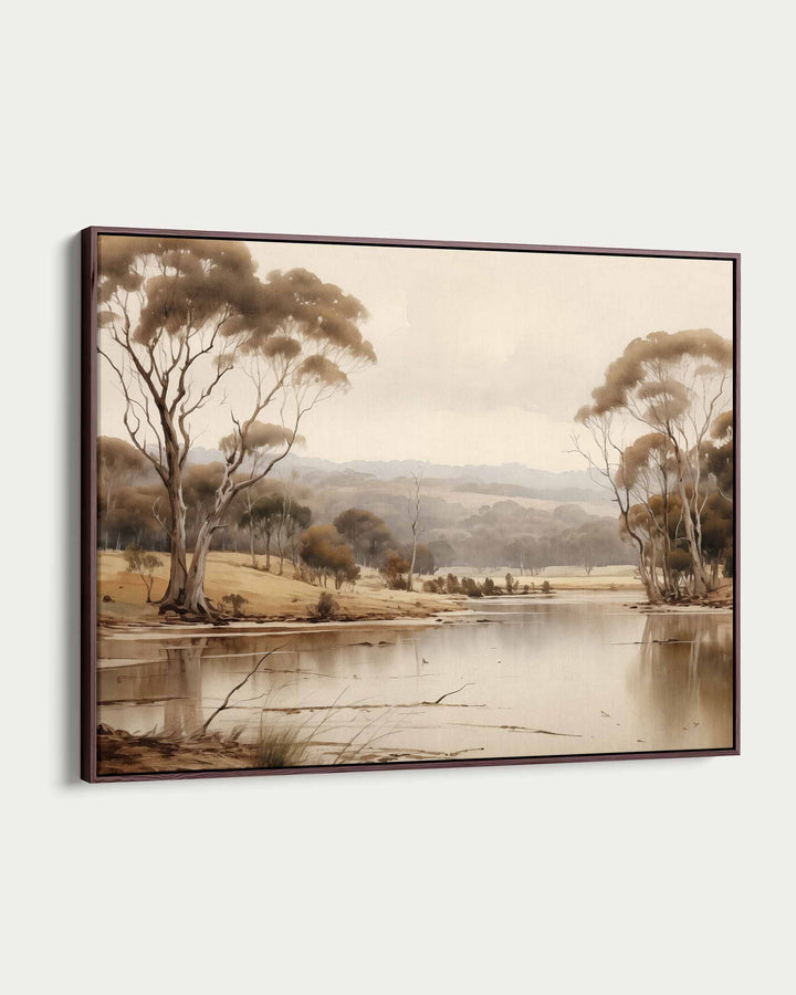 Framed artwork of a landscape with trees and a lake on a white background