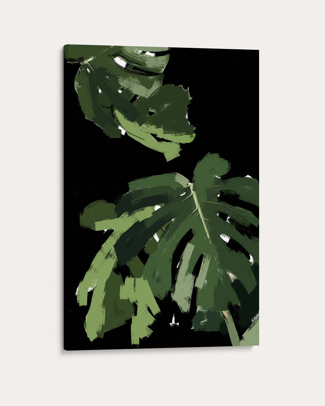 Canvas print with green leaf design on a black background