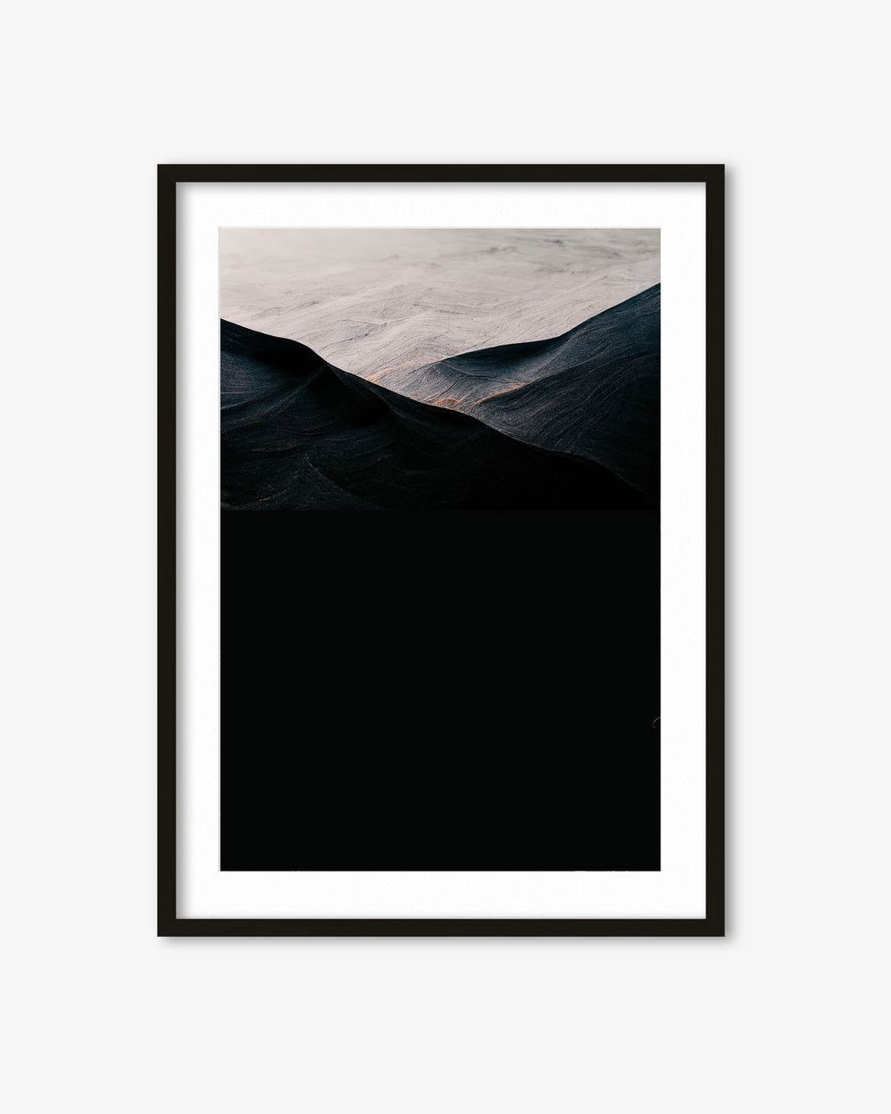 Framed artwork of a mountain landscape with a black frame on a white background