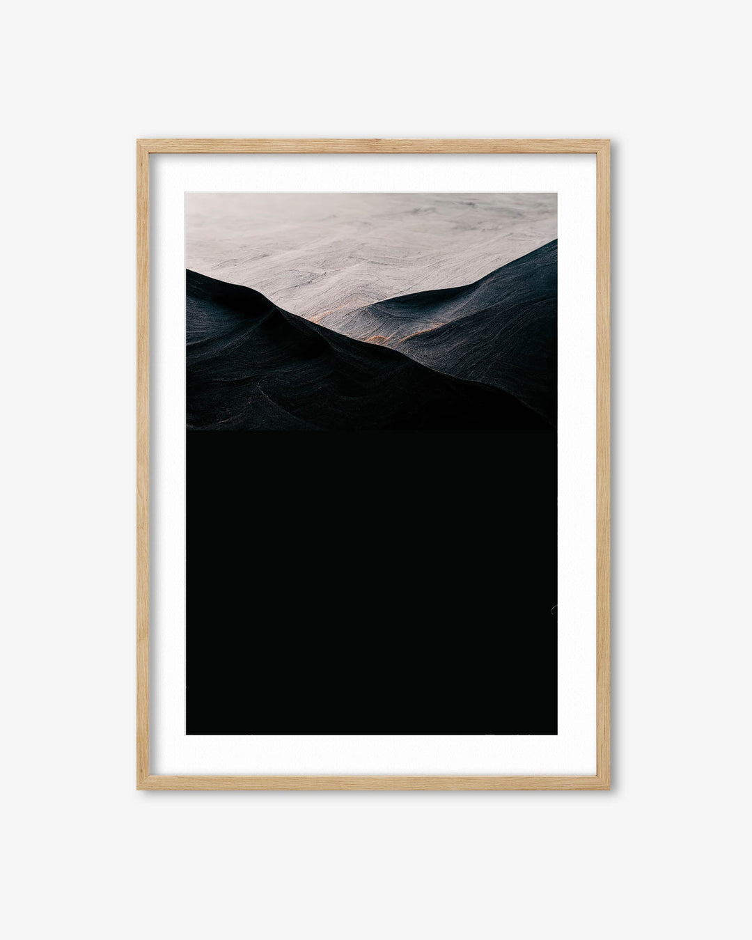 Framed artwork of a mountain landscape with a wooden frame on a white background