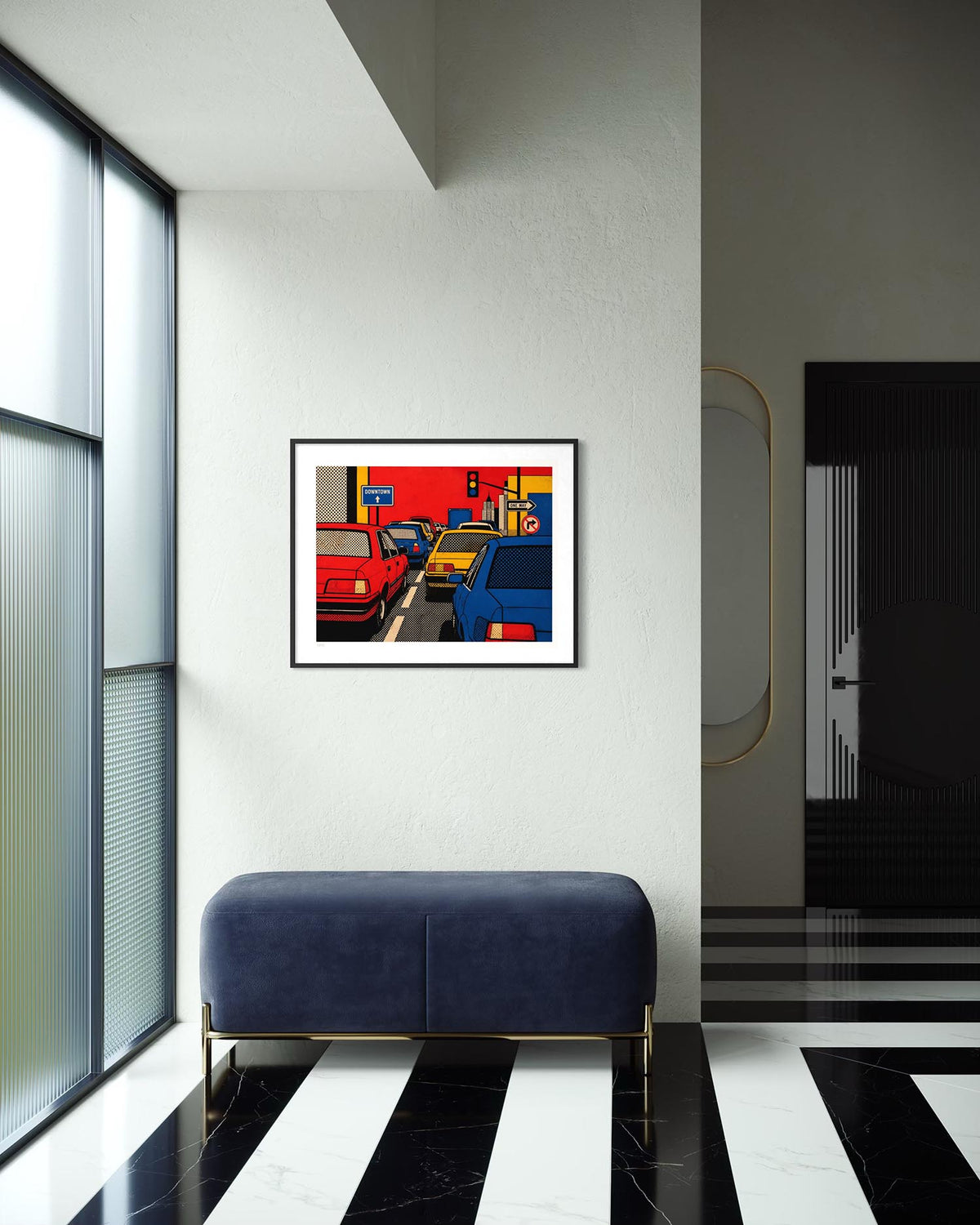 A framed pop art print of vintage cars hanging on a white wall in a modern hallway with a blue velvet bench and black-and-white striped floor.