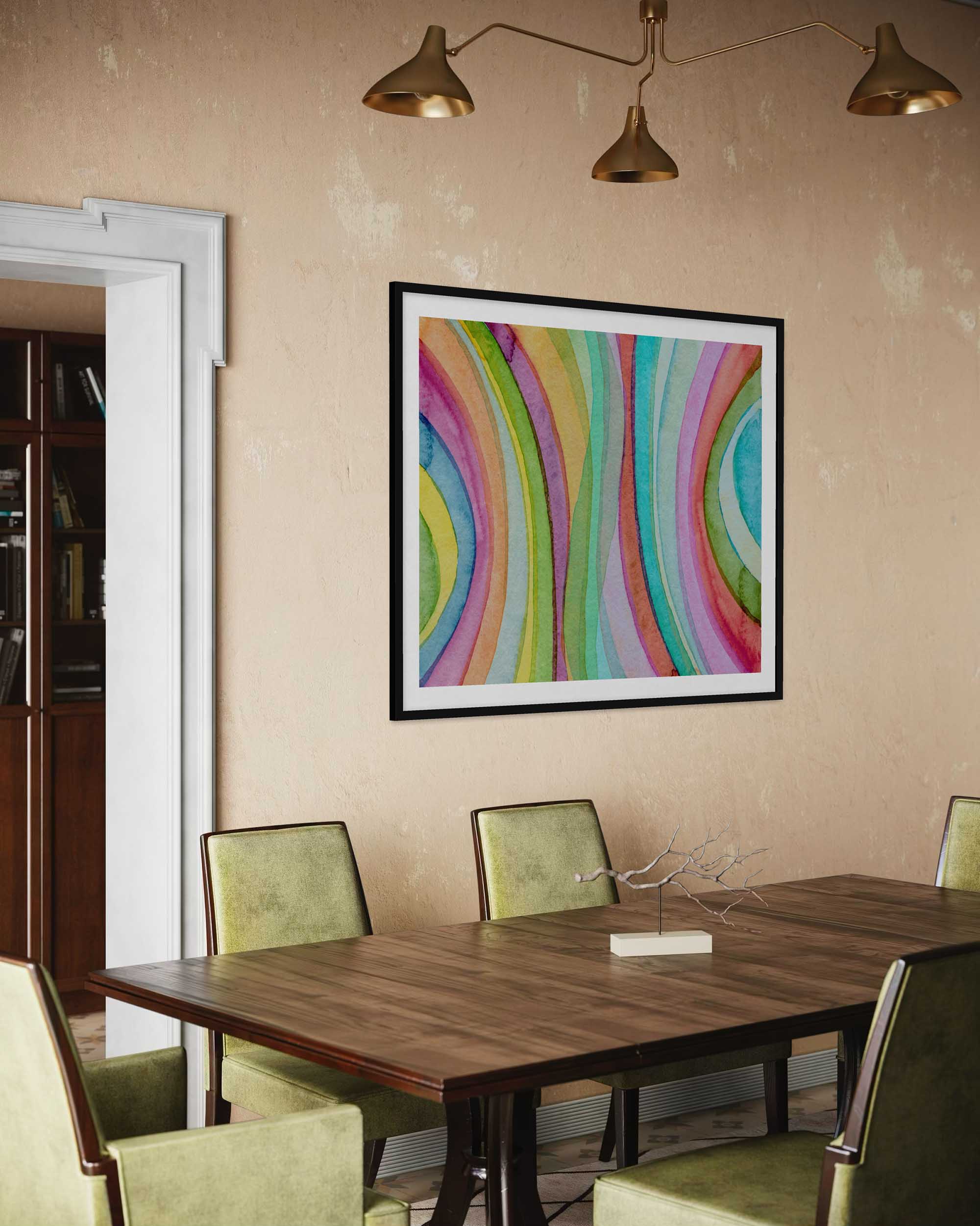 Dining room with a wooden table and green chairs, featuring a colorful abstract painting on the wall.
