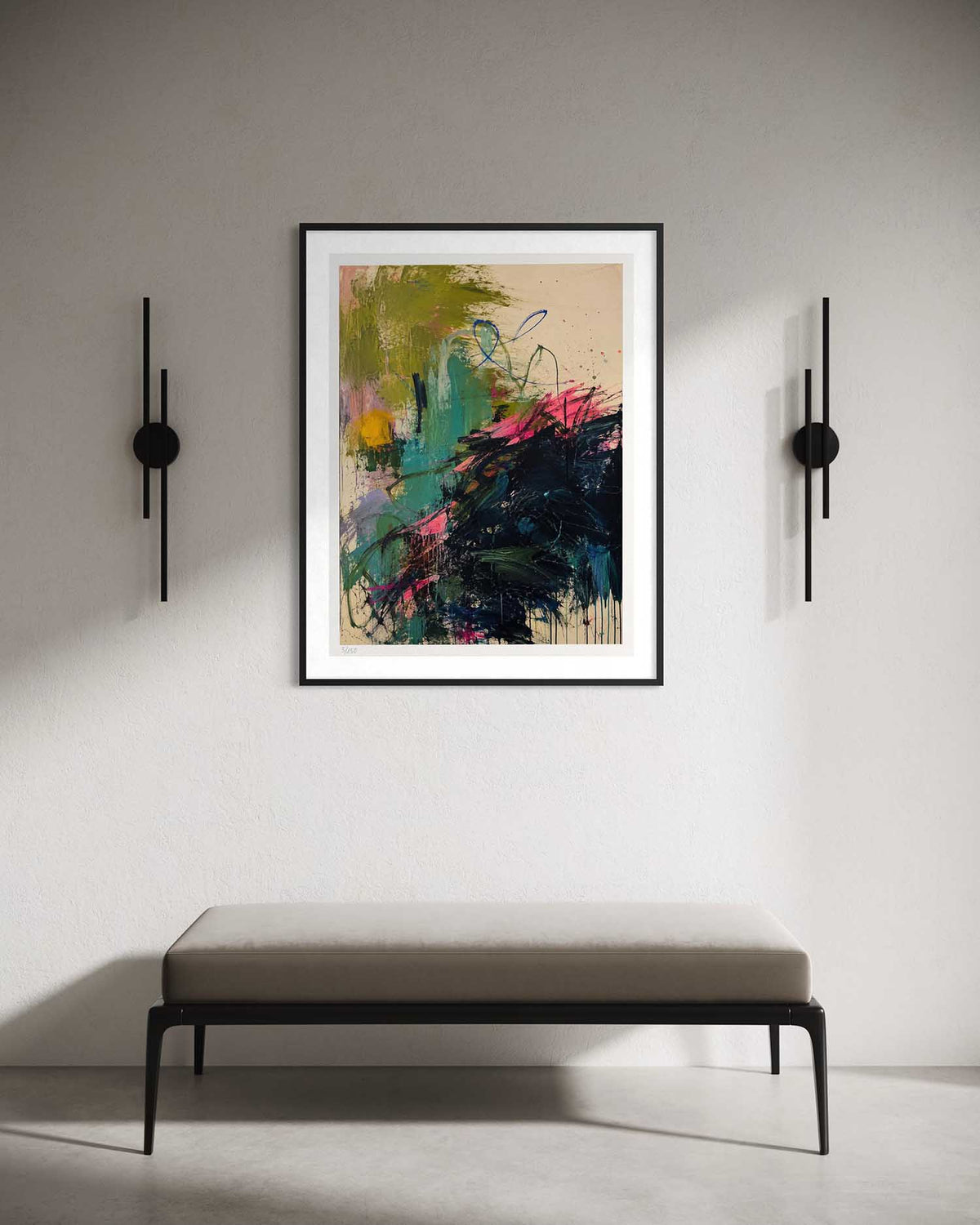 A framed abstract art print hangs on a light gray wall above a minimalist bench, flanked by two black wall sconces. The artwork features bold brushstrokes in green, teal, black, pink, and beige.