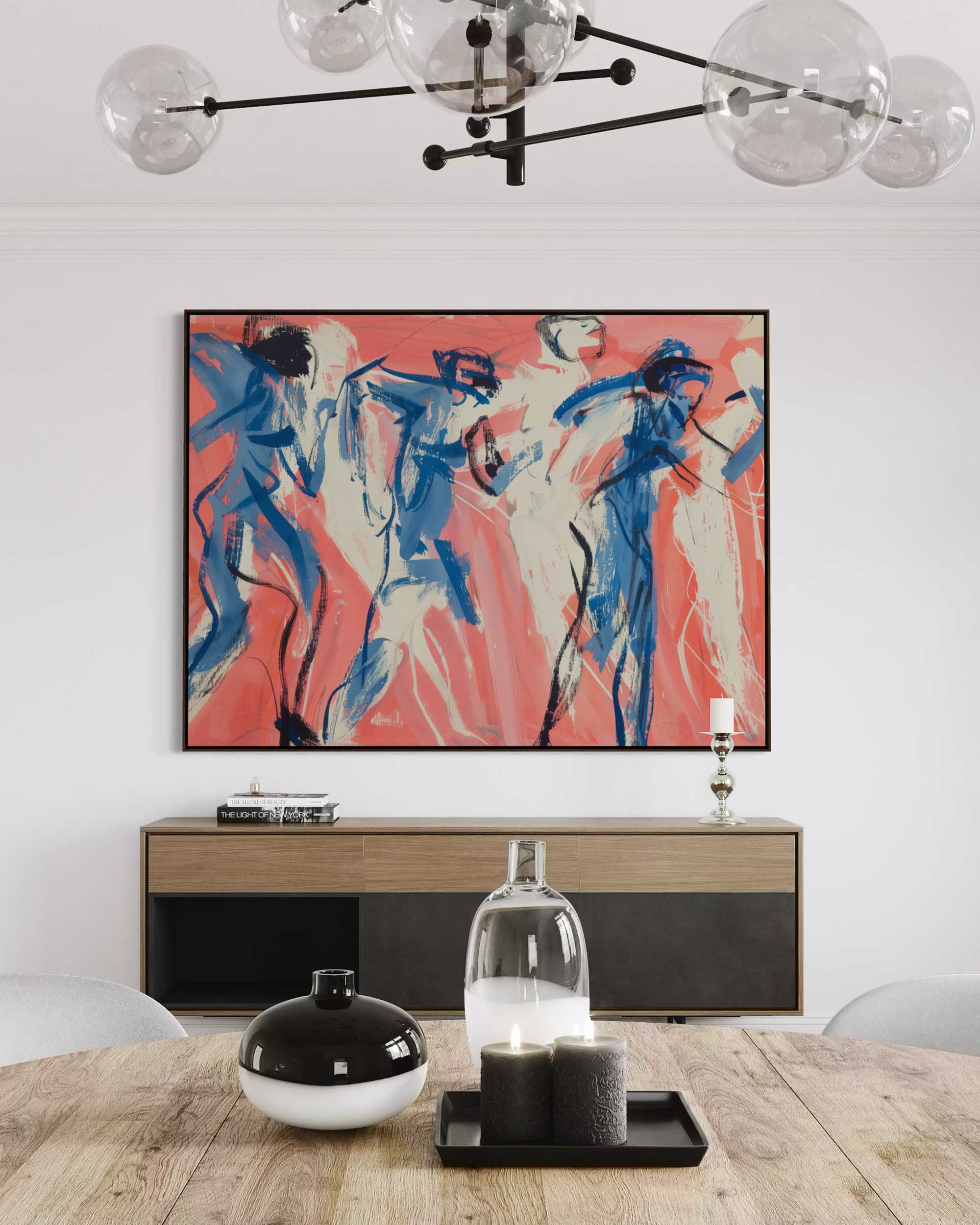 Modern interior with abstract painting, chandelier, and table setting.