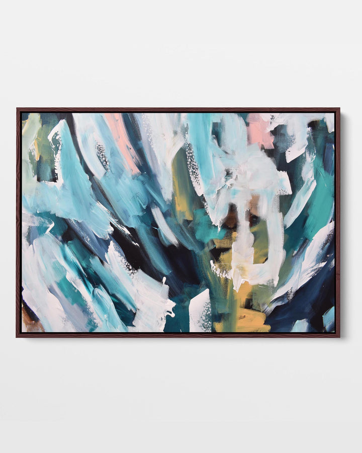 A framed canvas with an abstract design featuring modern blue, white, pastel pink, and green tones, presented in a black frame.