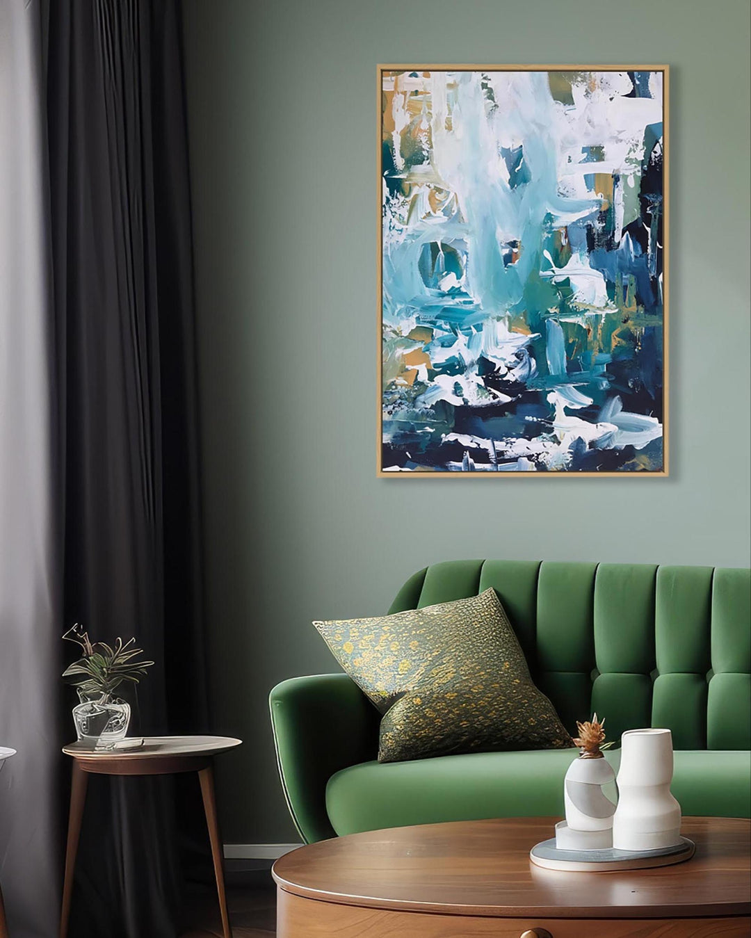 Living room with a green sofa, abstract painting on the wall, and decorative items.