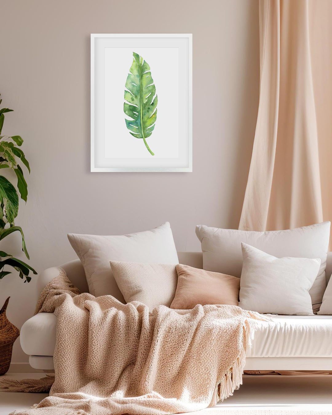 framed botanical art print above a beige sofa in a modern living room