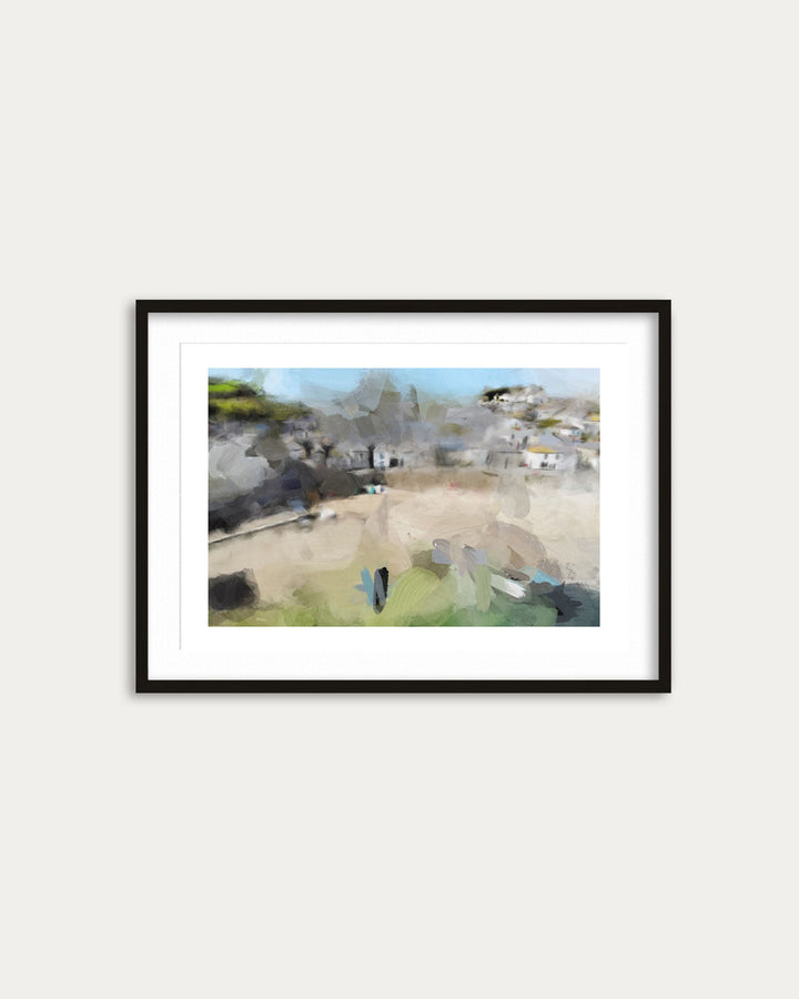 Framed artwork of a coastal village scene on a white wall