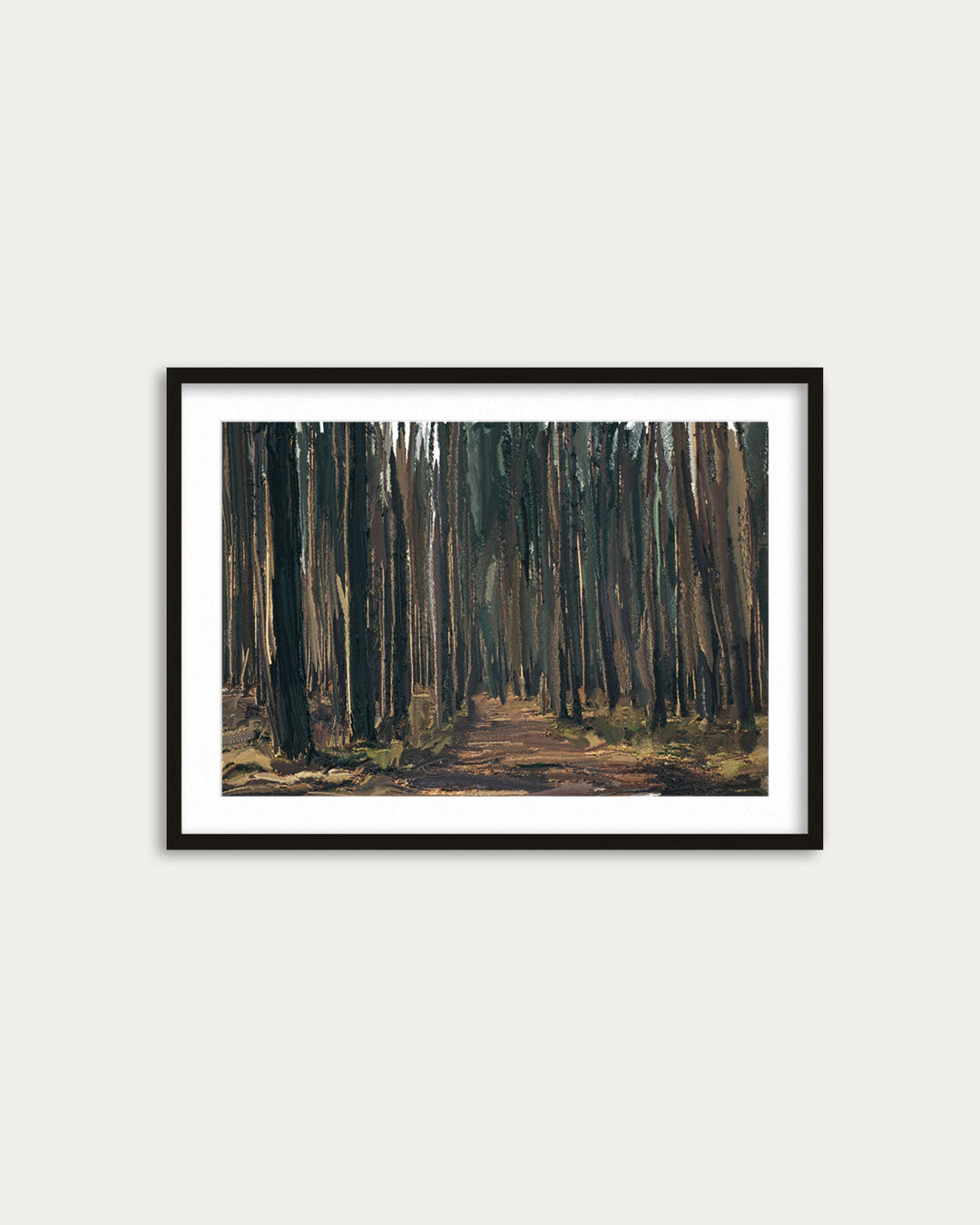 Framed painting of a forest path on a white wall